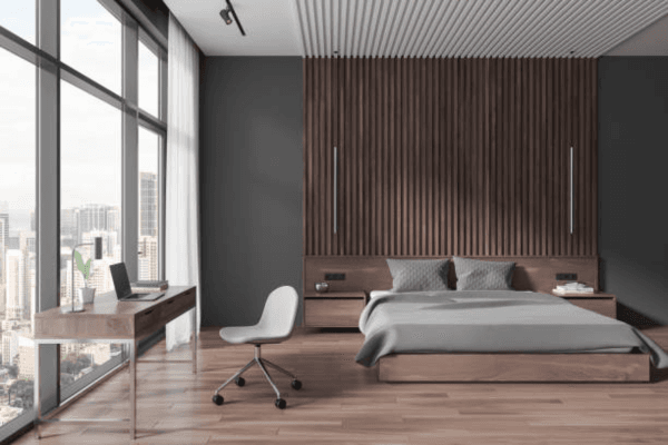 Wooden-look WPC panels used behind bed headboard