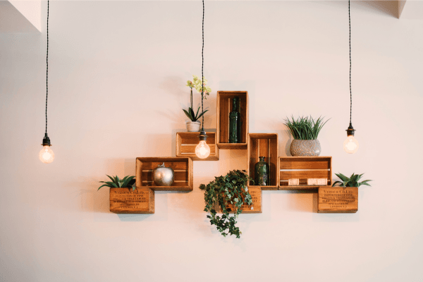 Abstract framed art shelves on living room wall