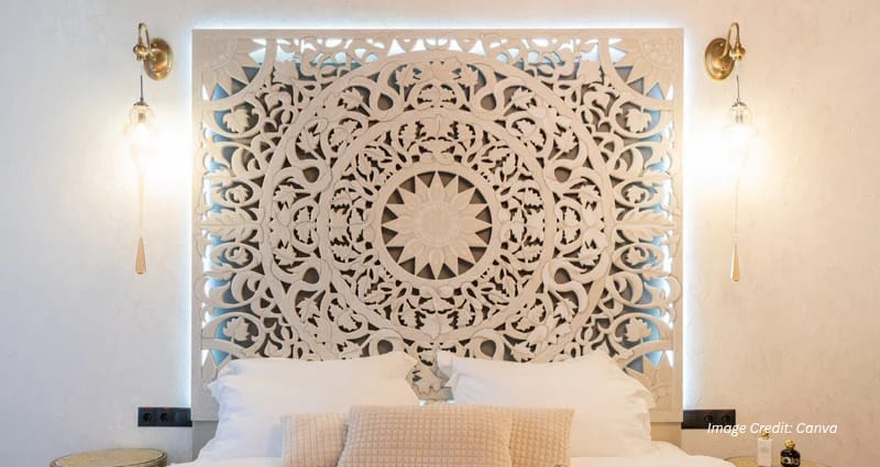 Oversized abstract canvas art above bed